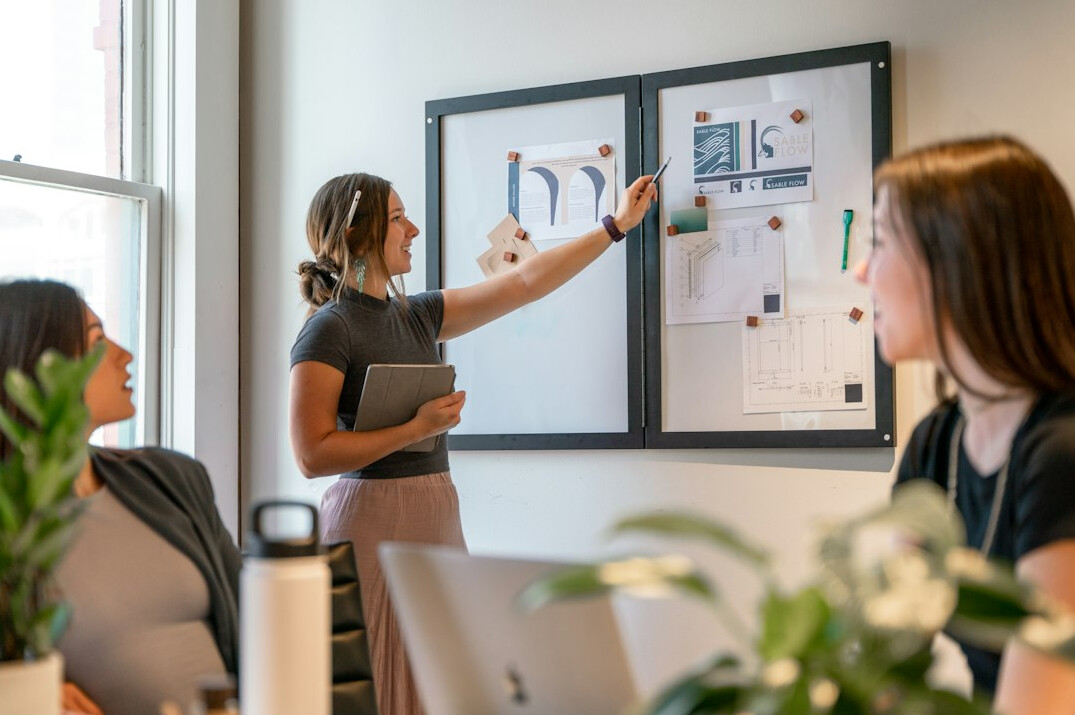 woman leading business meeting